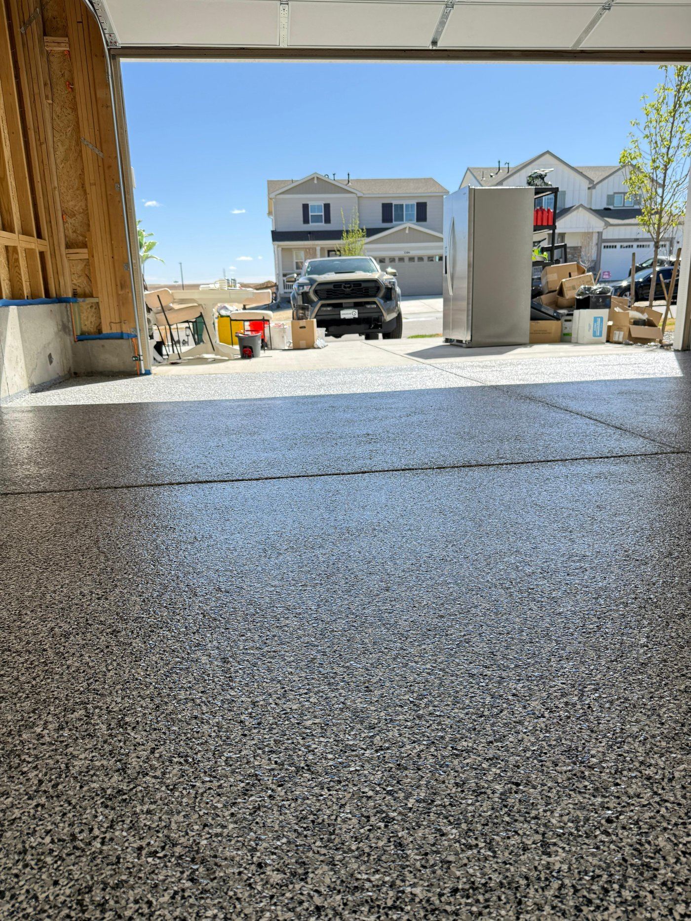 Epoxy garage floor with Toyota Tacoma truck